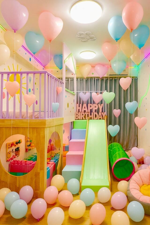 Indoor wooden playground with birthday decoration