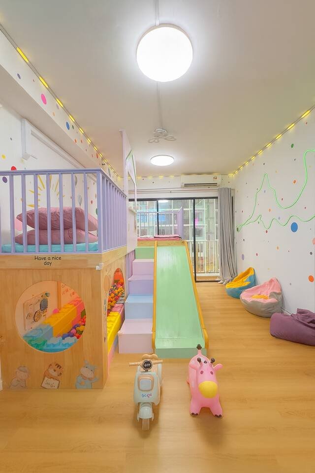 Indoor wooden playground family staycation area